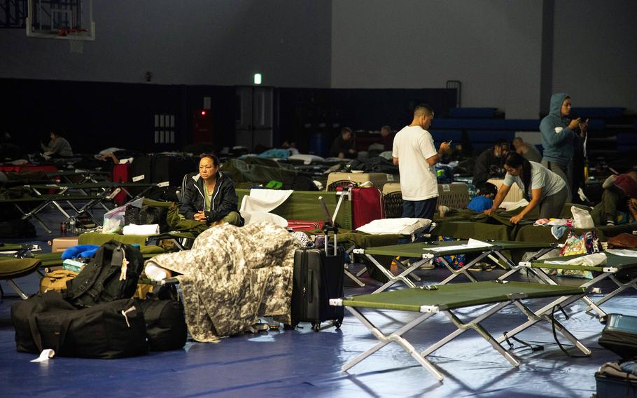 Many delayed Patriot Express passengers slept on cots inside a gym at Marine Corps Air Station Iwakuni, Japan, after a hard landing on July 13, 2021, forced their flight to return to Tokyo for repairs.