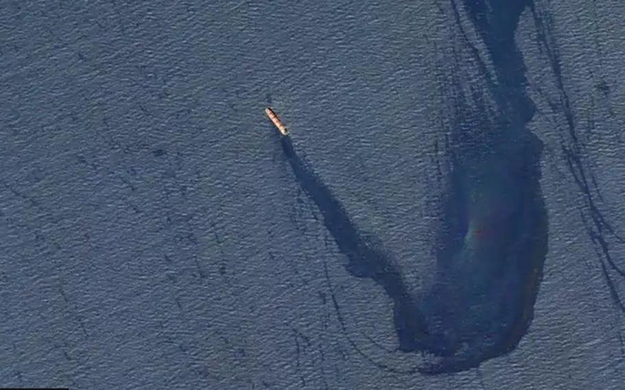 The M/V Rubymar, a Belize-flagged, UK-owned bulk carrier, which was attacked by Iran-backed Houthi militants on Feb. 18, 2024, is seen with an 18-mile oil slick. The M/V Rubymar was transporting over 41,000 tons of fertilizer when it was attacked, which could spill into the Red Sea and worsen this environmental disaster.