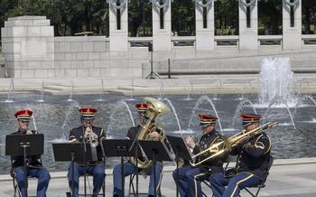 The U.S. Army Brass Quintet plays at the 20th anniversary celebration of the National World War II Memorial in Washington, May 25, 2024.
