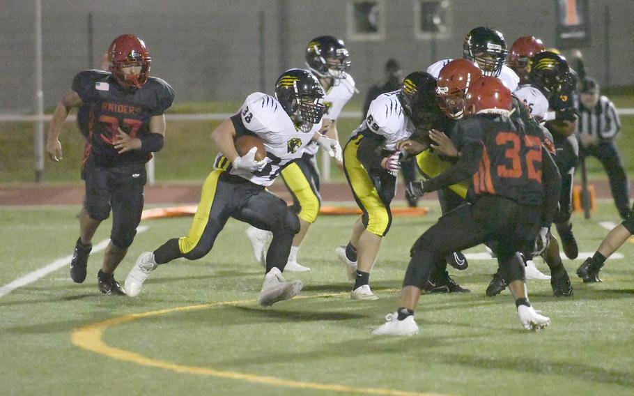 Stuttgart's Christian Just carries the ball during the Panthers' 53-12 victory Friday, Oct. 15, 2021, over the Kaiserslautern Raiders at Kaiserslautern. Just carried seven times for 60 yards and on defense had three solo tackles and one sack during the game.