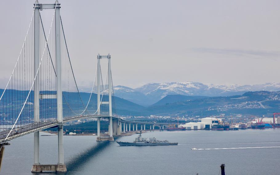The destroyer USS Nitze passes under the Osman Gazi Bridge in the Gulf of Izmit on Feb. 3, 2023, en route to Golcuk, Turkey.