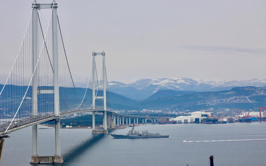 The destroyer USS Nitze passes under the Osman Gazi Bridge in the Gulf of Izmit on Feb. 3, 2023, en route to Golcuk, Turkey.