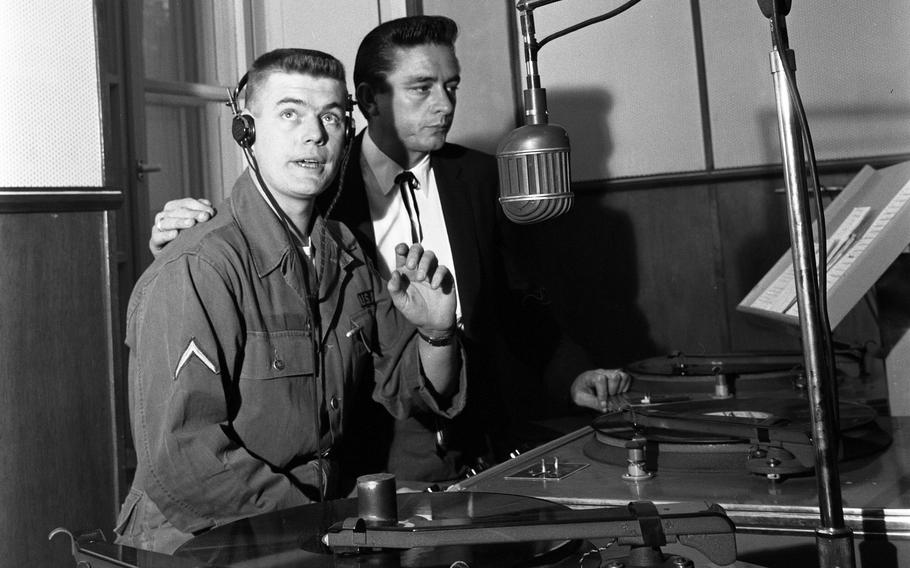 Johhny Cash visits the AFN radio studio in Frankfurt, Germany.