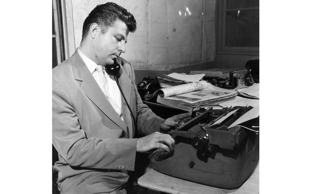 Hed: Getting the news, 1958

Tokyo, Japan, Sometime in 1958: Stars and Stripes staff writer Millard "Corky" Alexander types out the news dictated to him over the telephone. Alexander worked as a staff writer and assistant city editor for Pacific Stars and Stripes from 1957 to 1962. 
He would go on to co-found the Tokyo Weekender together with fellow S&S staff writer Susan Scully (nee Dibble) (1965 to 1967). The magazine, which saw its first issue roll of the press Feb. 13, 1970, still publishes today.


Check out Stars and Stripes Pacific's special 80th anniversary section highlighting other former Stars and Stripes Pacific staffers here.
https://80.stripes.com/80th-home

And read one of Corky's stories here.

META TAGS: SSP 80th anniversary; Stars and Stripes history; Stars and Stripes personnel; newspaper; journalists; journalism; typewriter; 