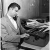 Hed: Getting the news, 1958

Tokyo, Japan, Sometime in 1958: Stars and Stripes staff writer Millard "Corky" Alexander types out the news dictated to him over the telephone. Alexander worked as a staff writer and assistant city editor for Pacific Stars and Stripes from 1957 to 1962. 
He would go on to co-found the Tokyo Weekender together with fellow S&S staff writer Susan Scully (nee Dibble) (1965 to 1967). The magazine, which saw its first issue roll of the press Feb. 13, 1970, still publishes today.


Check out Stars and Stripes Pacific's special 80th anniversary section highlighting other former Stars and Stripes Pacific staffers here.
https://80.stripes.com/80th-home

And read one of Corky's stories here.

META TAGS: SSP 80th anniversary; Stars and Stripes history; Stars and Stripes personnel; newspaper; journalists; journalism; typewriter; 