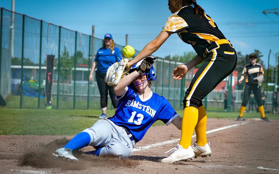 Lily Rethage of the Ramstein Royals slide into home during the DODEA-Europe Softball Championships in Kaiserslautern, Germany, May 18, 2023.