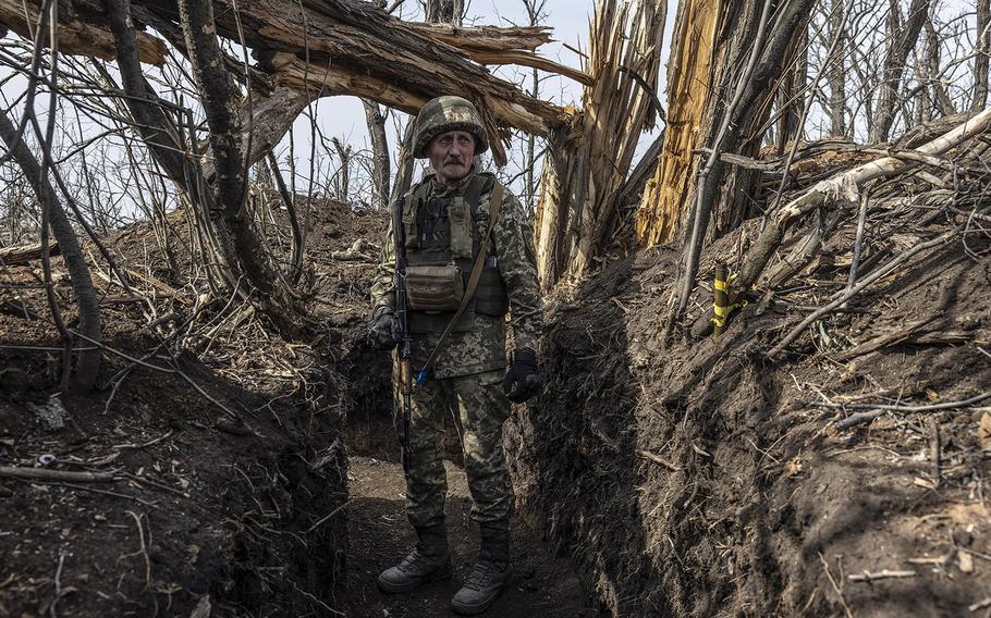 A soldier with the call sign Irpin, 53, from Ukraine’s 24th Separate Mechanized Brigade at a trench position near the town of Niu-York in eastern Ukraine on March 21, 2023. The front line has more or less stayed the same since 2014. 