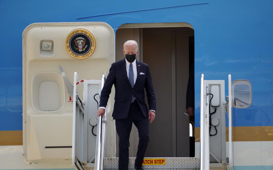 President Joe Biden departs Air Force One at Yokota Air Base in western Tokyo, Sunday, May 22, 2022. 