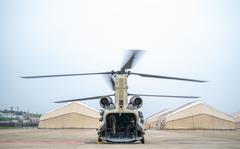 A CH-47 Chinook helicopter out of Camp Humphreys, South Korea, prepares for take-off at Kunsan Air Base, April 26, 2022. 