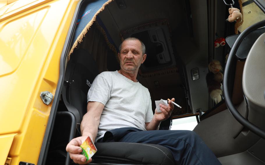 Grigoriy, a 56-year-old truck driver from Zhytomyr, stops at a station outside Lviv.