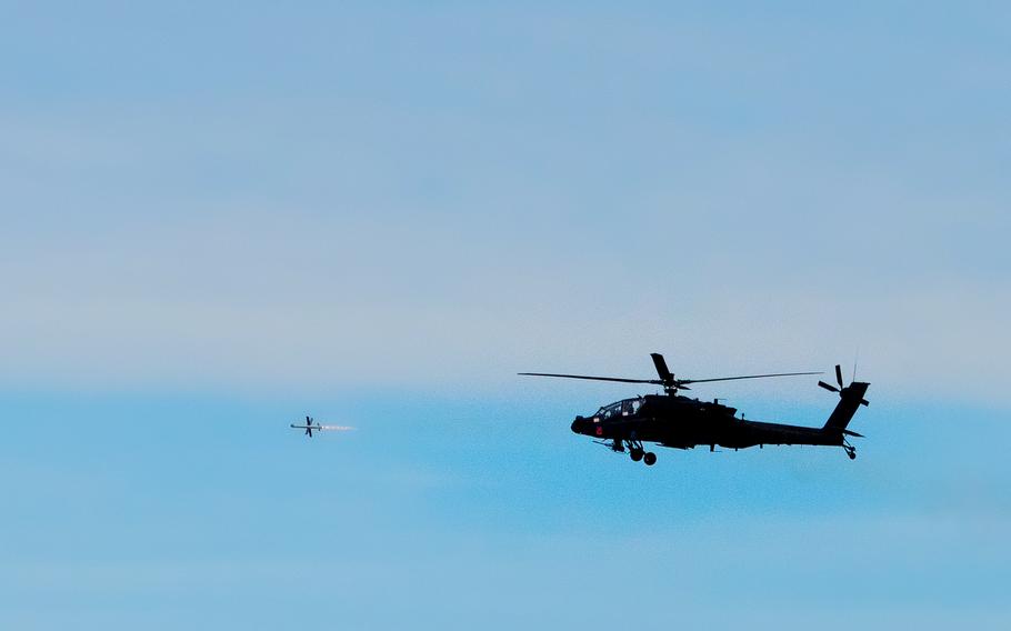 An AH-64Ev6 Apache from the 12th Combat Aviation Brigade fires the SPIKE NLOS missile.