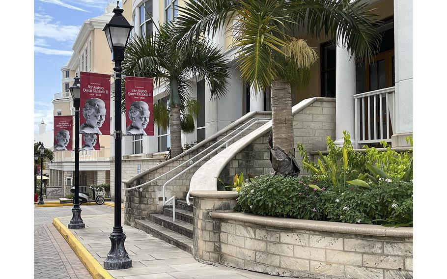 Banners on street poles in Hamilton pay tribute to Queen Elizabeth II in Hamilton, Bermuda, on Sept. 19, 2022.