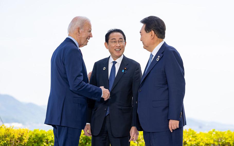 President Joe Biden meets with Japanese Prime Minister Fumio Kishida, center, and South Korean President Yoon Suk Yeol during the G7 Summit at the Grand Prince Hotel in Hiroshima, Japan, May 21, 2023. 