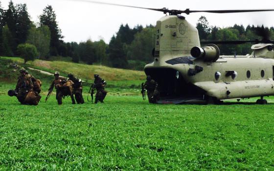 U.S. Marines exit a U.S. Army CH-47 Chinook during Exercise Aurora 17 in Gnesta, Sweden, in 2017. Marines crossed Norway’s border into Sweden on April 18, 2023, to join Aurora 23, one of the region’s largest military drills in decades. Some 26,000 troops from 14 countries are taking part in maneuvers that will be carried out on land, at sea and in the air. 

