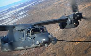 A 71st Special Operations Squadron CV-22 Osprey receives fuel from a Combat Shadow II aircraft over New Mexico on Jan. 4, 2012. 