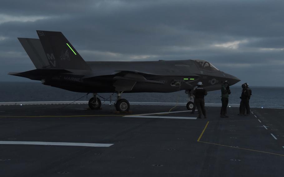 An F-35B Lightning II attached to Marine Operational Test and Evaluation Squadron (VMX) 1 idles on the flight deck of amphibious assault ship USS Tripoli.