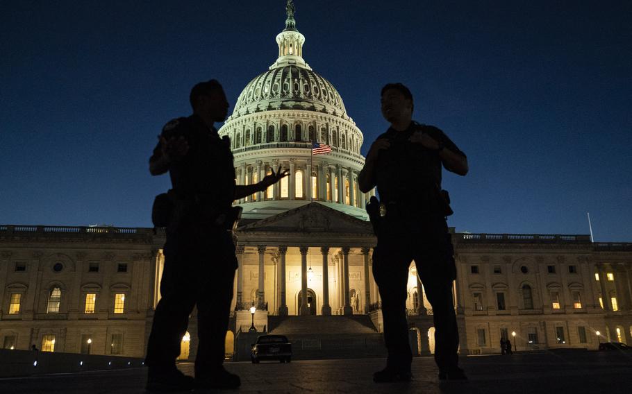 U.S. Capitol Police officers stand guard Sept. 27, 2021, on Capitol Hill.