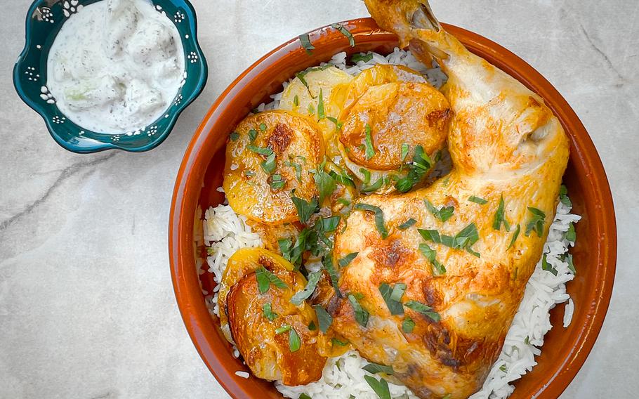 Roasted chicken tawa, served with potatoes, onions and rice at Civat Middle Eastern Kitchen in Landstuhl, Germany. Chickpea flour and spices are used to marinate the chicken.