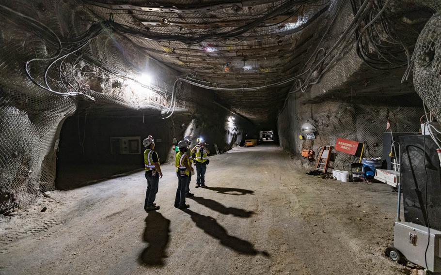 A tour group walks in a geological repository, U.S. Department of Energy’s Waste Isolation Pilot Plant, storing transuranic radioactive waste in the desert between Hobbs and Carlsbad on Aug. 17, 2021