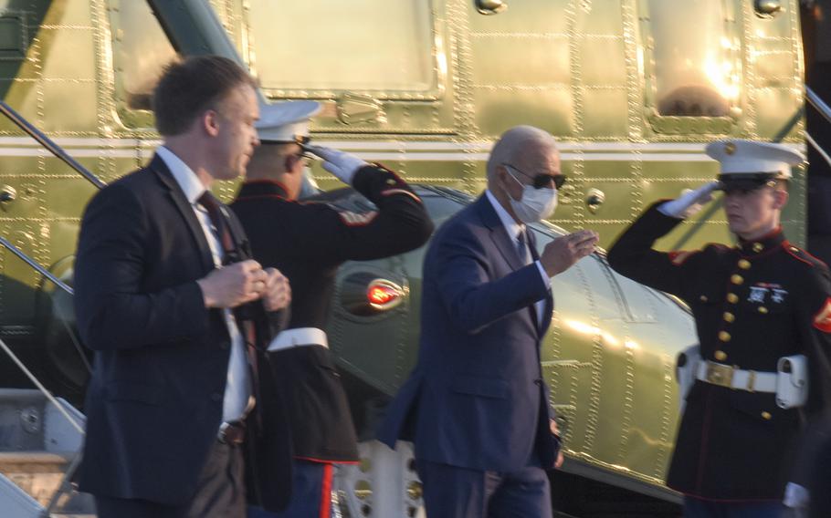President Joe Biden departs Marine One at Yokota Air Base in western Tokyo, Tuesday, May 24, 2022. 