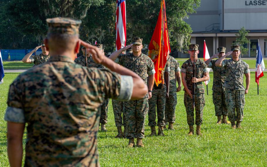 U.S. Marine Corps Col. Karl Arbogast, outgoing commanding officer, Marine Corps Air Station (MCAS) Beaufort, renders a salute during the national anthem at a Change of Command ceremony, MCAS Beaufort, S.C., July 7, 2023. Arbogast relinquished command of MCAS Beaufort to Col. Mark Bortnem. 