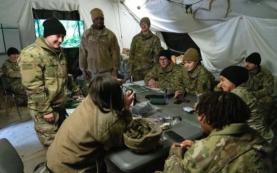 Members of Delta Battery’s hot crew, responsible for heating up Patriot missiles prior to launch, hang out in a tent, March 7, 2023.