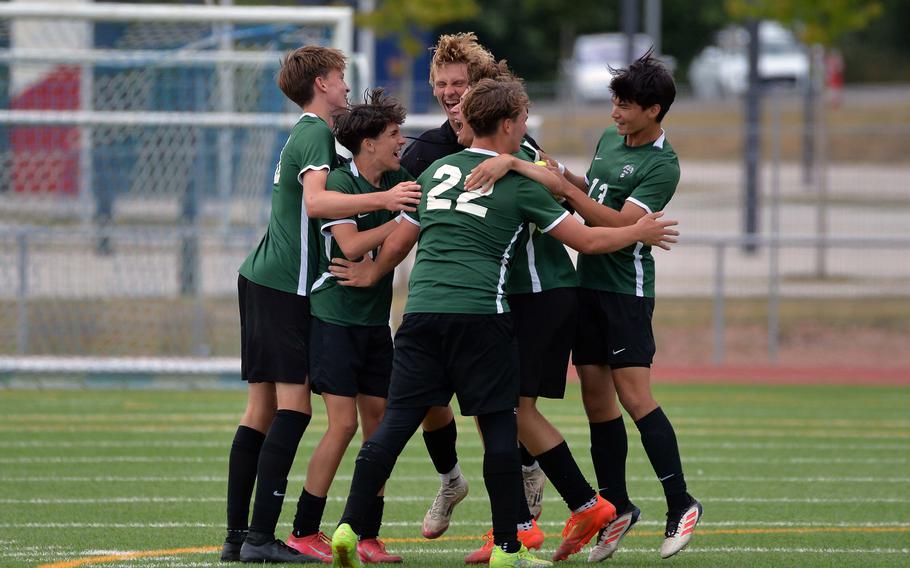 Members of the Naples Wildcats celebrate their 5-2 win over American Overseas School of Rome in the boys Division II final at the DODEA-Europe soccer championships in Ramstein, Germany, May 22, 2025.