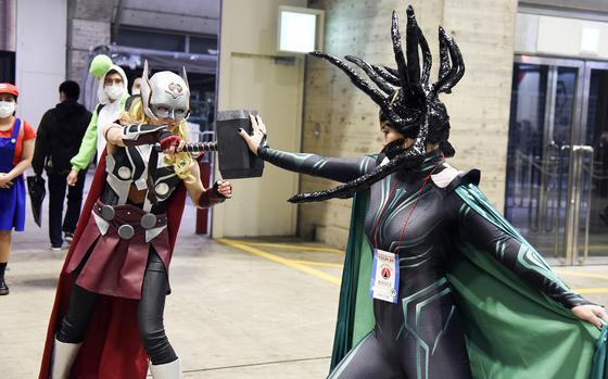 Cosplayers do their thing during Tokyo Comic Con at the Makuhari Messe convention center in Chiba, east of central Tokyo, Nov. 25, 2022.