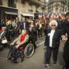 From the left, holocaust survivors Ginette Kolinka, Arlette Testyler, Jacques Altmann, and Ester Senot walk during the commemoration of the 80th anniversary of the return of the deportees, in Paris, France, Sunday, April 27, 2025. (AP Photo/Thomas Padilla)