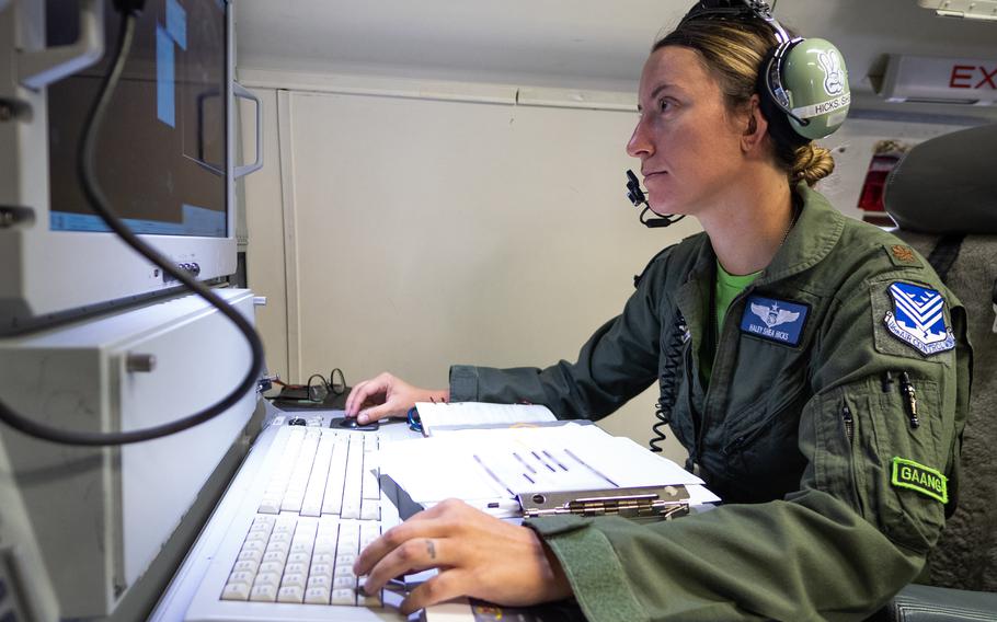 A crew member performs pre-flight checks aboard an E-8C Joint STARS assigned to the 116th Air Control Wing, Georgia Air National Guard, at Robins Air Force Base, Ga., Aug. 14, 2020. A JSTARS aircraft flew missions in and around Poland and Romania in recent days, according to public air tracking websites. 