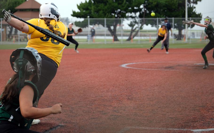 Kadena batter Jana Hurst slaps a single up the middle against Kubasaki.