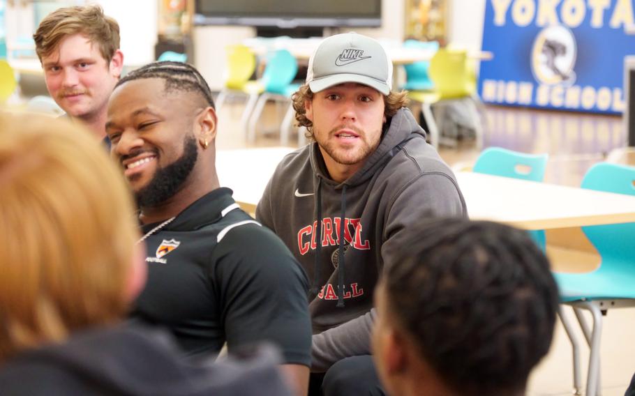 Ivy League football players take part in a Q&A session with members of the Yokota High School Panthers at Yokota Air Base, Japan, Jan. 19, 2024.