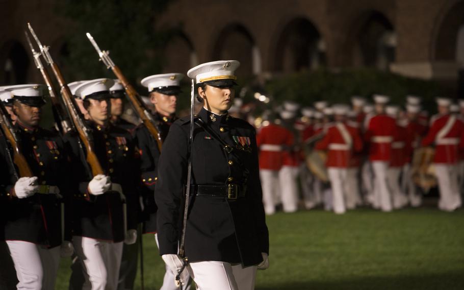Capt. Kelsey Hastings will take command of the Marine Corps’ Silent Drill Platoon on Nov. 21, 2022, becoming the first female member of the unit and its first female commander. Hastings is pictured here as a first lieutenant in October 2021, leading the Marines’ other ceremonial marching platoons during a retirement parade for Gen. Gary Thomas at the Marine Barracks Washington.