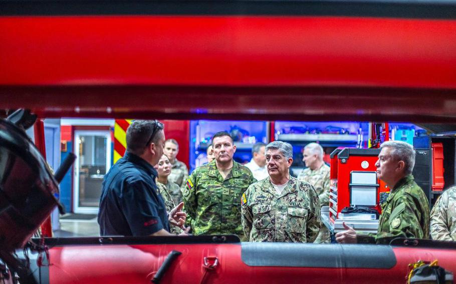 Members of the Armed Forces of Ecuador visit with senior leaders of the Kentucky National Guard, Kentucky Emergency Management and Lexington Fire Department at the Lexington Fire Training Academy in Lexington, Ky., on Thursday, Feb. 1, 2024.