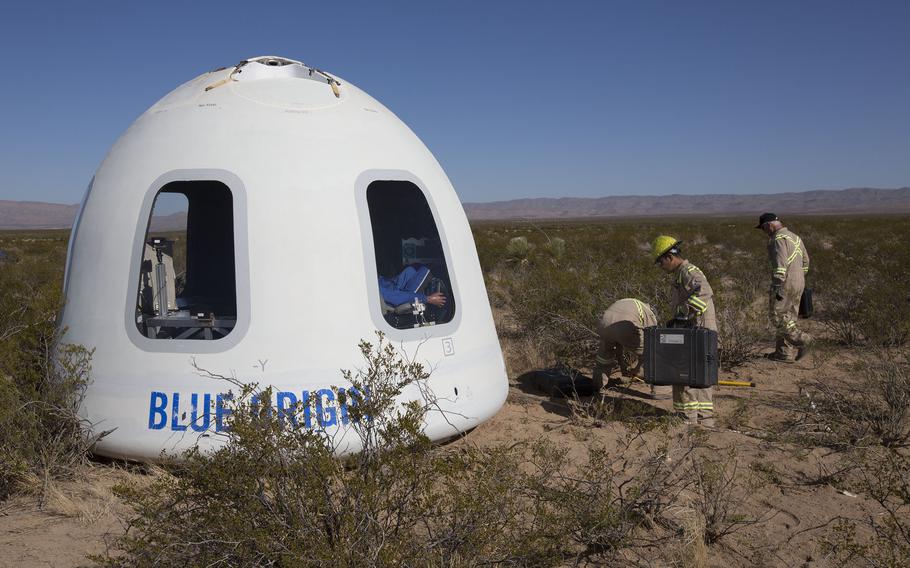 After completing a successful flight, a Blue Origin capsule lands safely in the West Texas desert on Dec. 12, 2017.