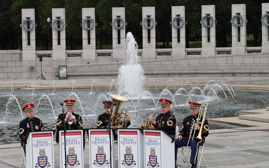 The U.S. Army Brass Quintet plays at the World War II Memorial on the National Mall in Washington, D.C., on Memorial Day, May 29, 2023.