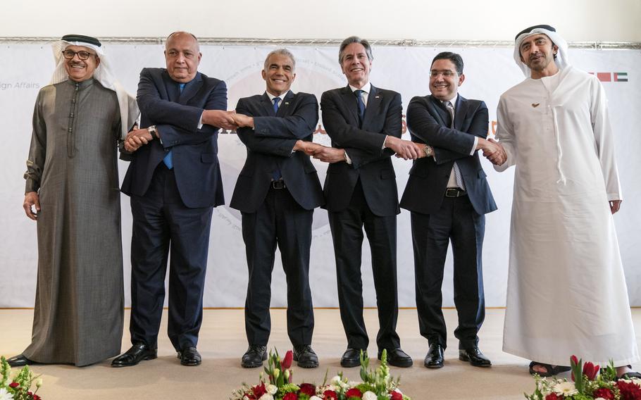 After meeting for the Negev Summit, Bahrain’s Foreign Minister Abdullatif bin Rashid al-Zayani, left, Egypt’s Foreign Minister Sameh Shoukry, Israel’s Foreign Minister Yair Lapid, U.S. Secretary of State Antony Blinken, Morocco’s Foreign Minister Nasser Bourita, and United Arab Emirates’ Foreign Minister Sheikh Abdullah bin Zayed Al Nahyan, pose for a photograph Monday, March 28, 2022, in Sde Boker, Israel. 
