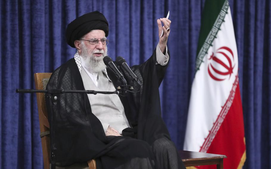 Supreme Leader Ayatollah Ali Khamenei speaks in a meeting.