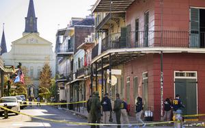 FILE -The FBI investigates the area on Orleans St and Bourbon Street by St. Louis Cathedral in the French Quarter where a suspicious package was detonated after a person drove a truck into a crowd earlier on Bourbon Street on Wednesday, Jan. 1, 2025. (AP Photo/Matthew Hinton, File)
