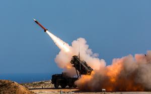 A Patriot air defense missile launches at the NATO Missile Firing Installation in Chania, Greece, in November 2017.