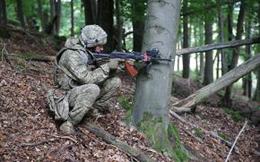 A Ukrainian soldier returns fire on opposing forces during Saber Junction 21 at the Hohenfels Training Area in Bavaria, Germany, on Sept. 18, 2021. 