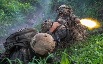 U.S. Army Sgt. Ratu Komaisavai, a sniper assigned to the 100th Infantry Battalion, roleplaying as opposing forces, fires blank rounds during a simulated n engagement as part of the Joint Pacific Multinational Readiness Center-Exportable exercise at Fort Magsaysay, Philippines, June 7, 2024.