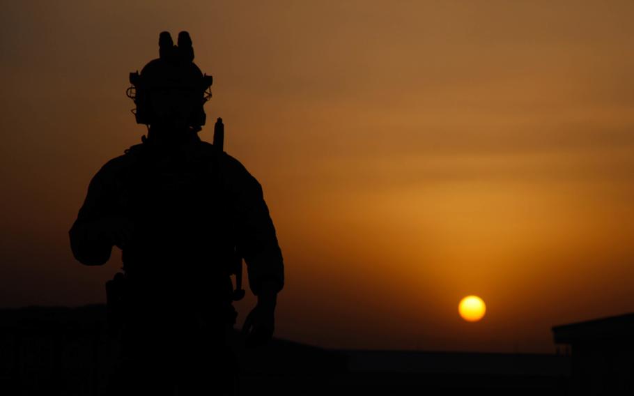 A U.S. Special Forces soldier waits for nightfall to start an operation in Laghman province, Afghanistan, in 2016. A Texas man who the Justice Department says claimed to be a Delta Force operator and offered protection against drug cartels is charged with wire fraud.