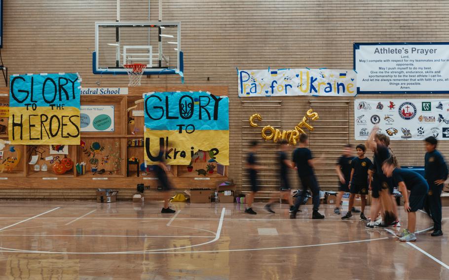 The school gymnasium is filled with signs of support for Ukraine. 