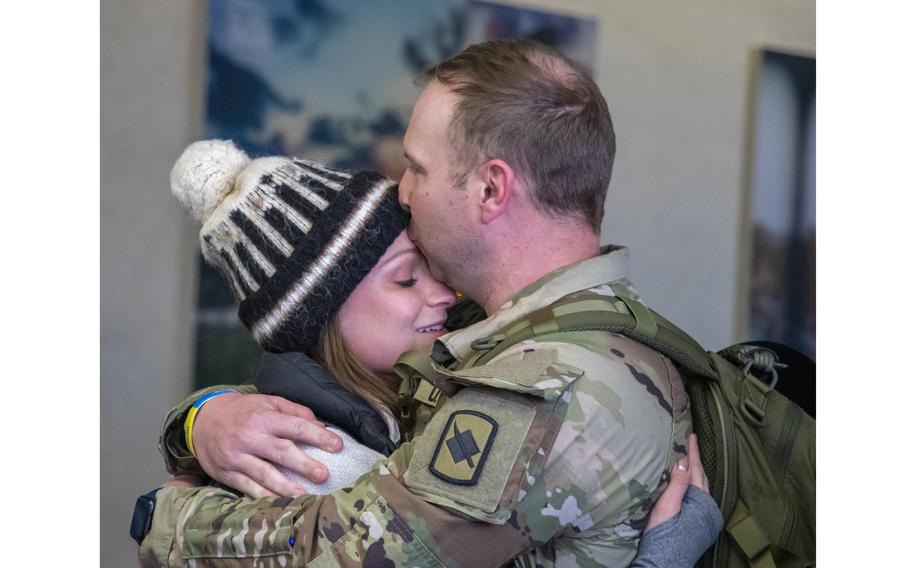Family and friends welcome home 10 Nebraska Army National Guard soldiers on Jan. 13, 2024, at Eppley Airfield in Omaha, Neb. 