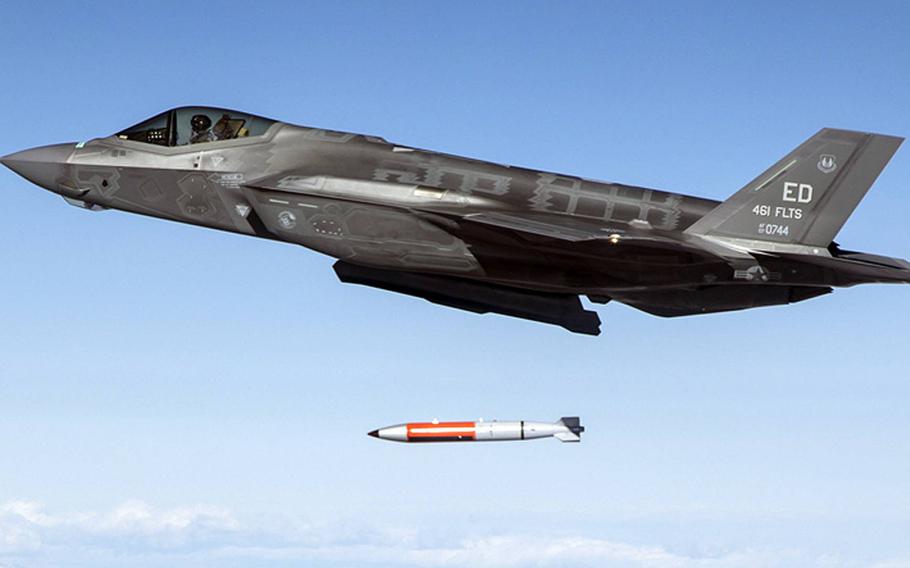 An F-35 Lightning II fighter jet releases an inert B61-12 bomb during a test in December 2021. The Pentagon said Friday, Oct. 27, 2023, that it’s seeking to develop a modern variant of the bomb, the B61-13.