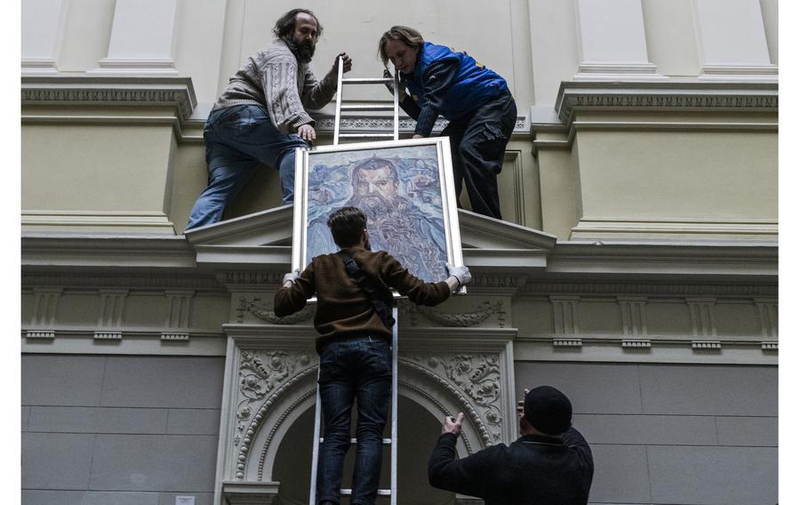 The portrait of Metropolitan Archbishop Andrey Sheptytsky painted by Oleksa Novakivsky is the last painting to be taken down from the walls in the Andrey Sheptytsky National Museum in Lviv on March 7, 2022. 
