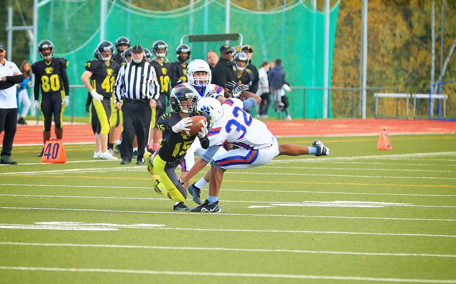 Stuttgart’s Jace Holmes hauls in a pass Saturday during the Panthers’ 61-7 victory over the Ramstein Royals in the DODEA-Europe Division I football semifinals. The Panthers will play Vilseck next weekend for the title.