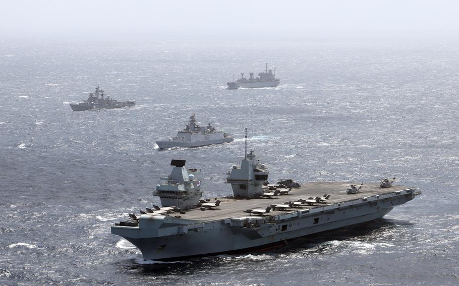 The U.K. Carrier Strike Group, including the aircraft carrier HMS Queen Elizabeth, train with the Indian navy in the Indian Ocean, July 21, 2021.