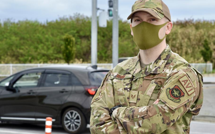Air Force Staff Sgt. Garrett Bodie poses in Yomitan village, Okinawa, Feb. 11, 2022. Bodie helped a Japanese farmer escape a burning vehicle late last month. 